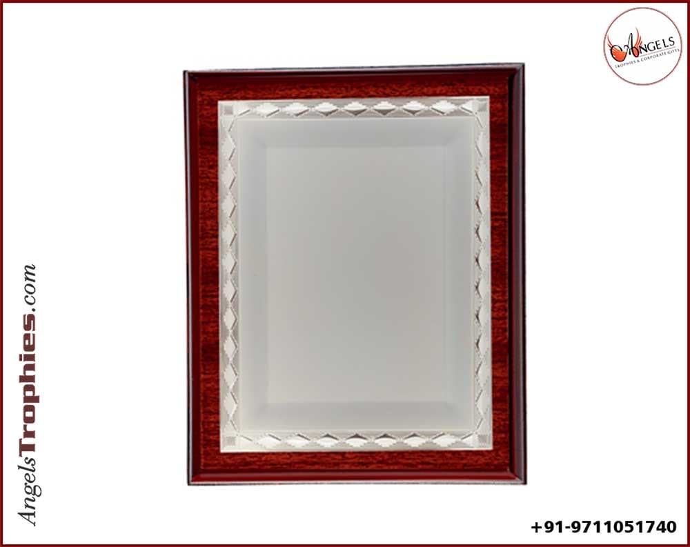 wooden plaque award with silver frame with plaque