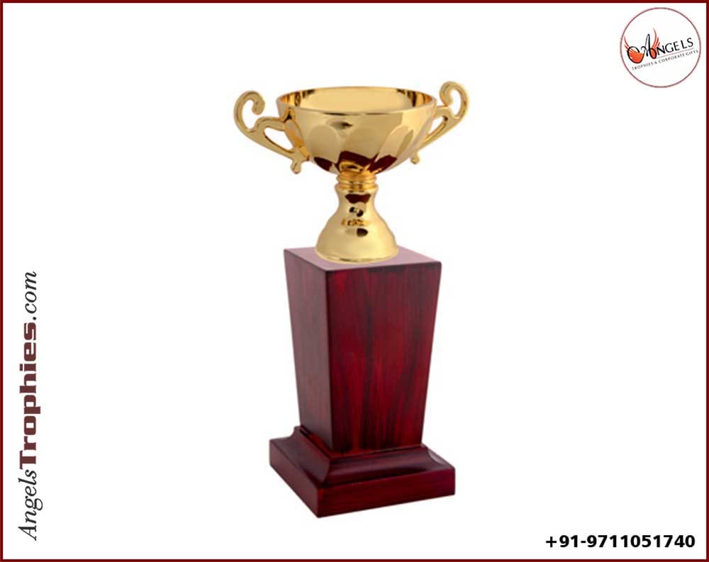 Metal cup with wooden base