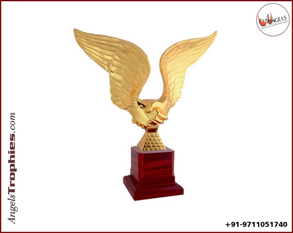 metal eagle award trophy with shape with wooden base