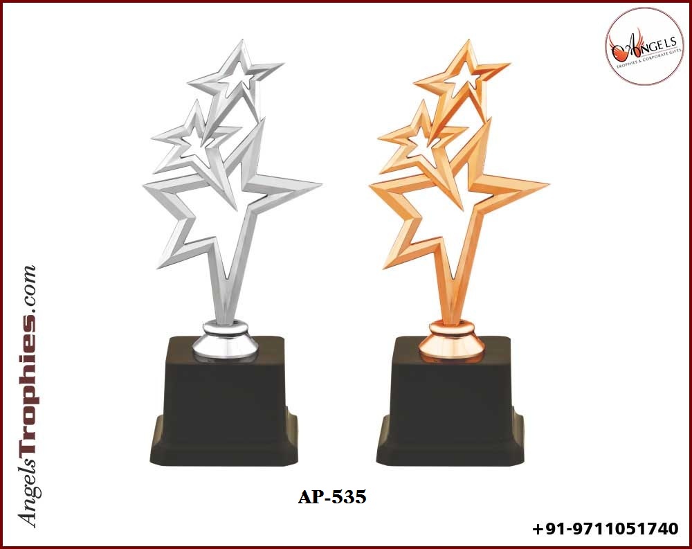 Plastic Fiber star with silver and bronze trophy with base