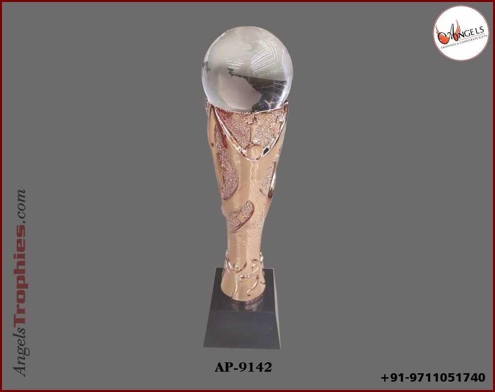 Metal Bronze heavy trophy with crystal globe ball with black base