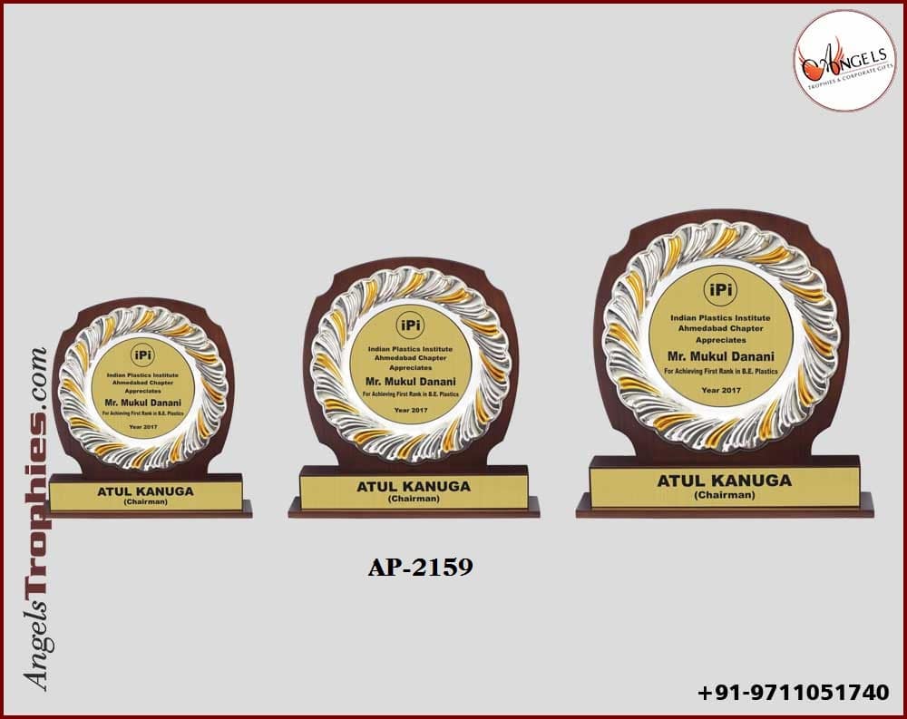 Wooden shield award trophy with metal rund frame with wooden base trophy