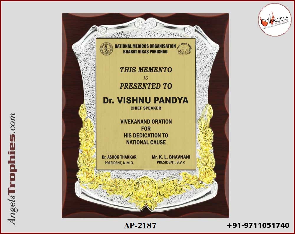 wooden award plaque with metal silver frame with plaque