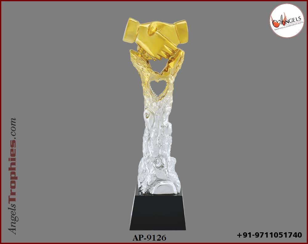 crystal trophy award with golden handshake with base