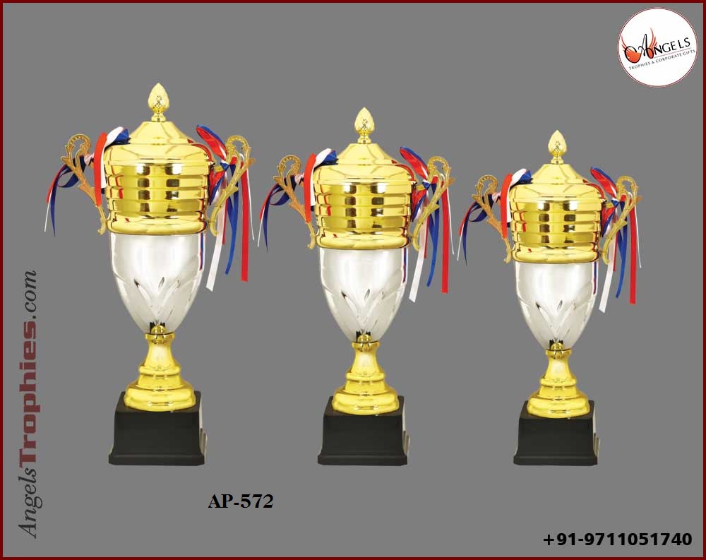metal golden and silver cup with base