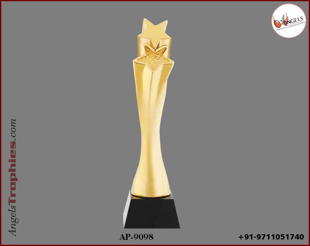 Metal golden star trophy award with base