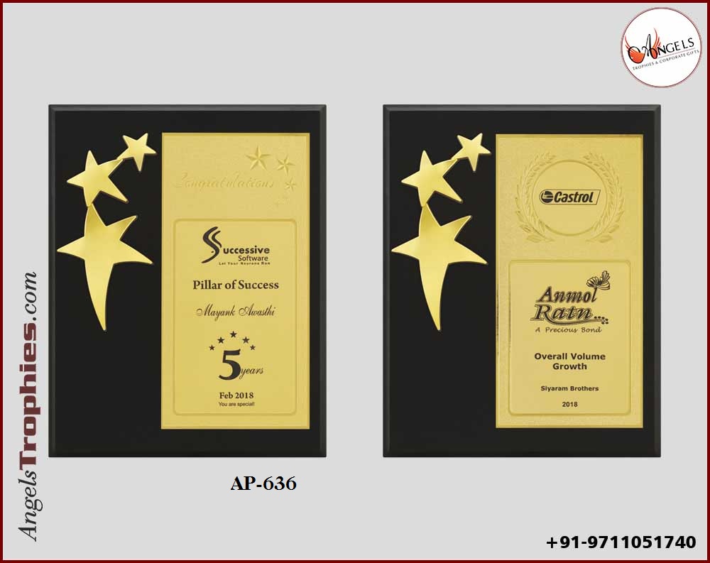 wooden award plaque with golden metal three star