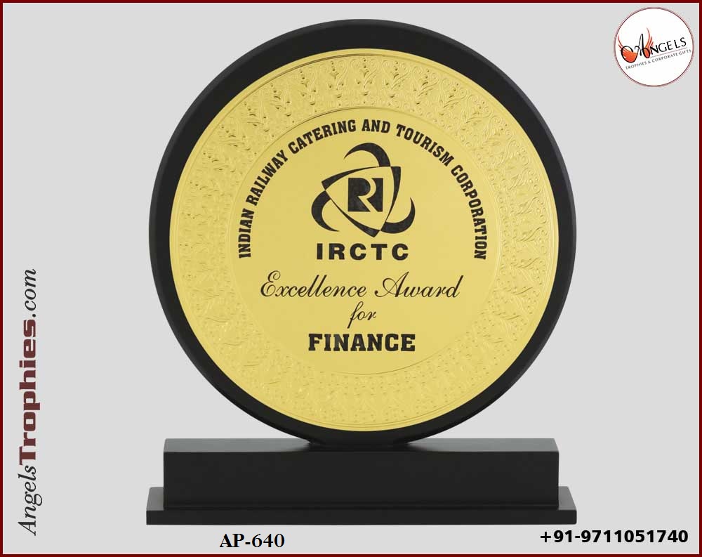 wooden award trophy with golden metal