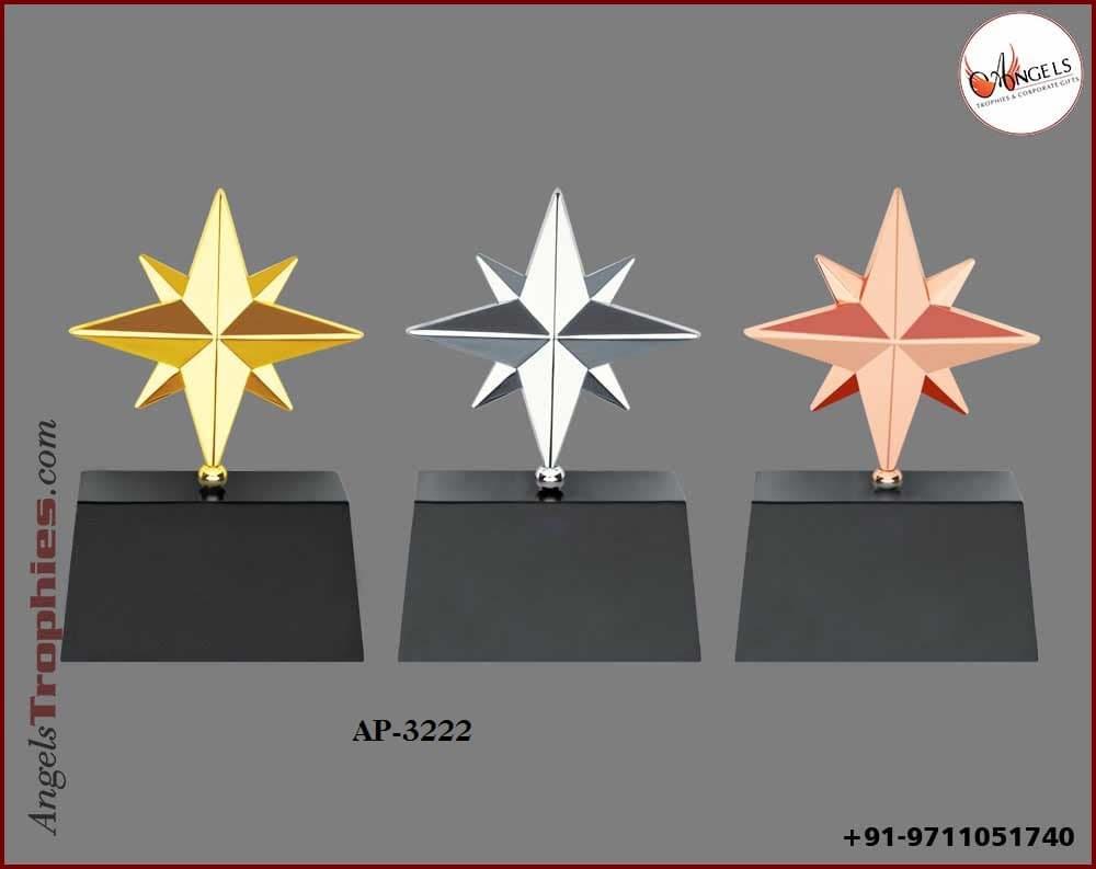 metal golden silver bronze star with wooden base