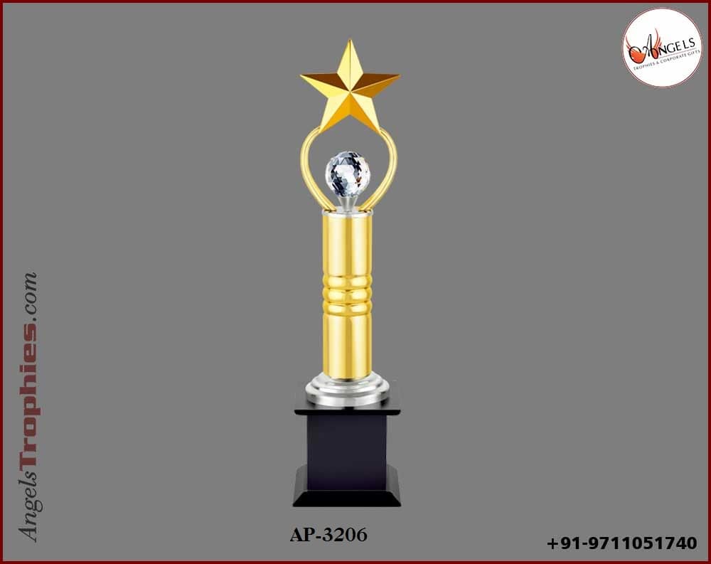 metal golden trophy award with golden metal star with base
