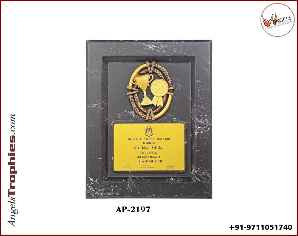 black wooden shield award with cup