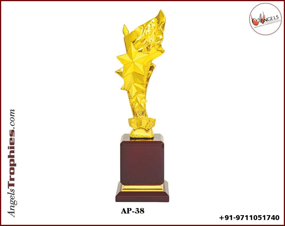 metal golden heavy star with wooden base