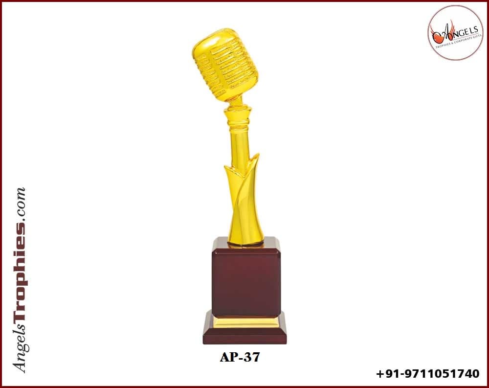 metal golden mic trophy with wooden base