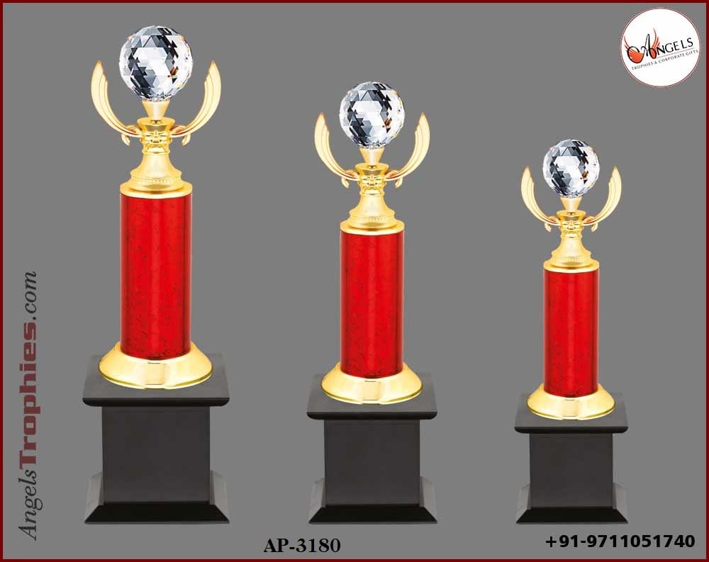 metal golden trophy award with crystal ball with base