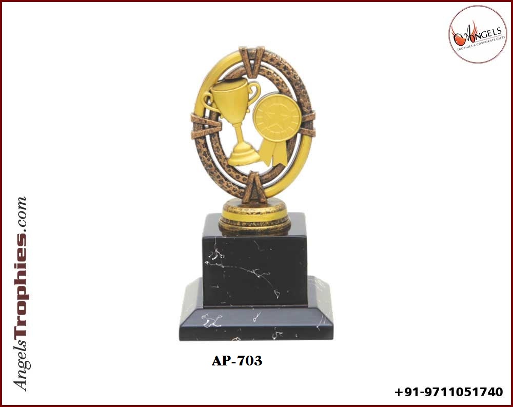Fibre raisin trophy with cup and medal shape with wooden base